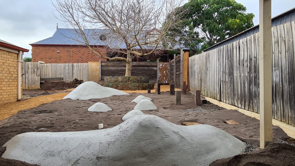 Custom backyard putting green and play area landscaping, Melbourne