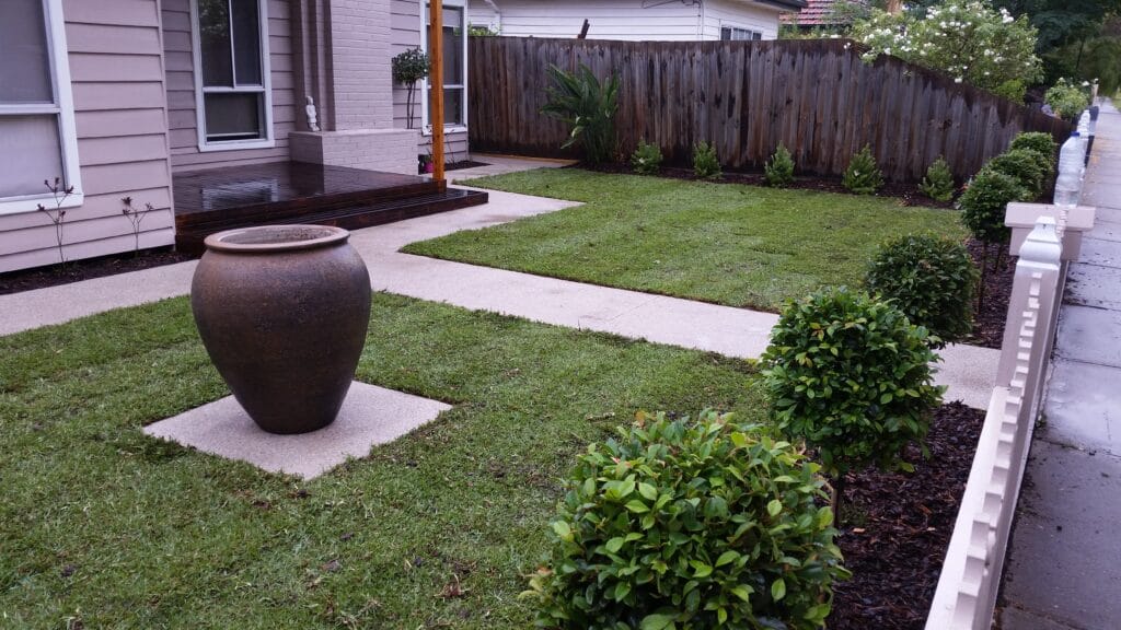Garden landscaping with concrete steppers and garden beds, Bacchus Marsh