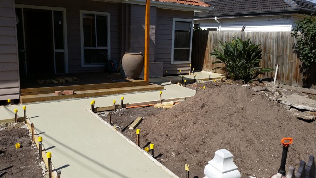 Avenue topiary planting and exposed aggregate entrance path, Bacchus Marsh