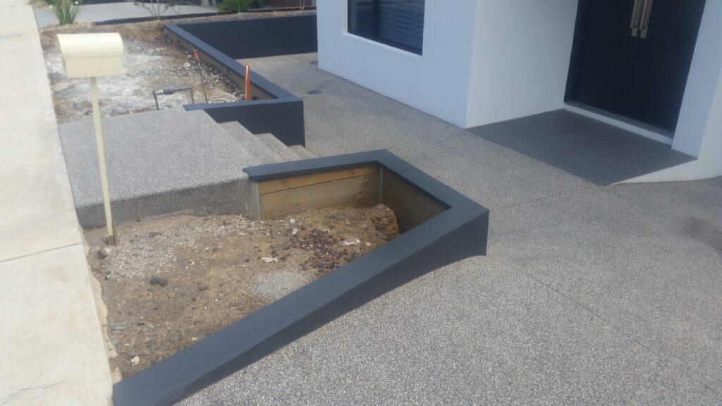 Concrete block retaining walls with steps, tight-access site, Bacchus Marsh