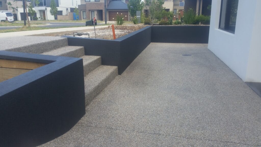 Concrete retaining wall and exposed aggregate path built in Bacchus Marsh