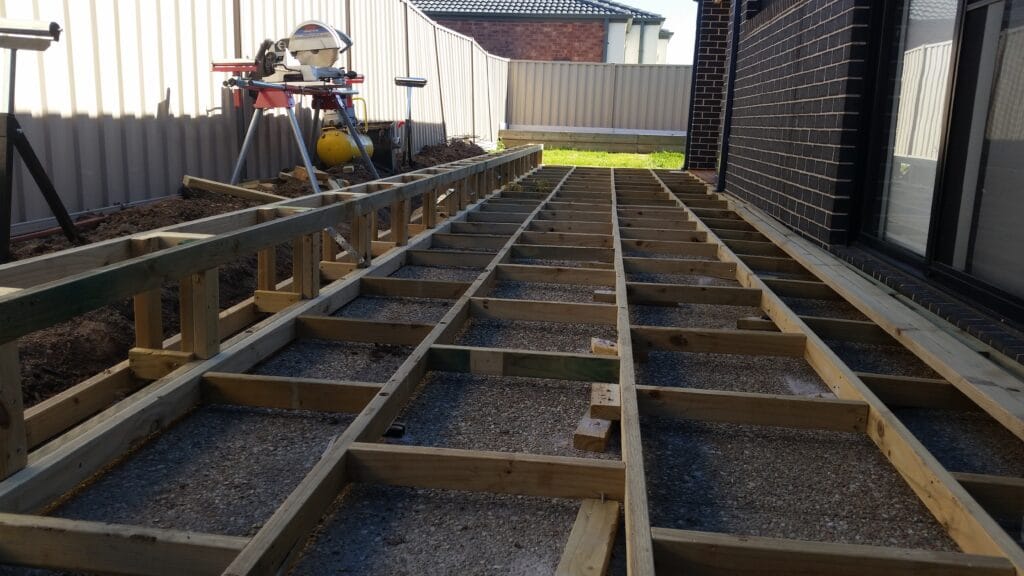 Timber sleeper retaining wall in narrow side access, Melbourne
