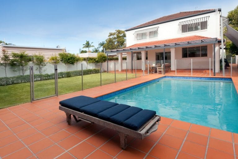 Pool landscaping with compliant fencing and paving by CreationScapes